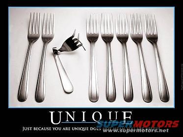 Several forks lined up, one is broken