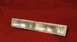 1989 Ford Bronco II - Clear plastic marker light with ribbed interior, likely for an older vehicle.