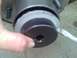 1989 Ford Bronco - Fit the spanner socket onto the locking nut and tuck the bushing in.