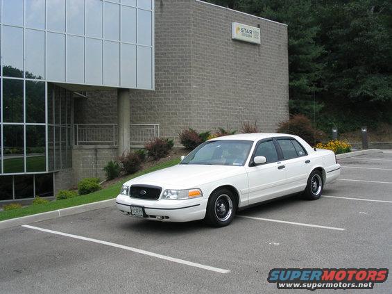 White 1998 Ford Crown Victoria parked in a lot