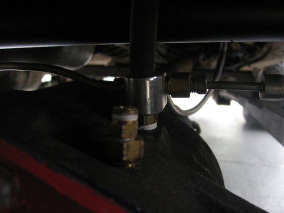 Close-up of brake line fitting on rear axle