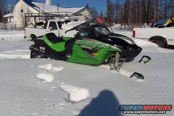 2004 Arctic Cat F-7 Firecat snowmobile in snow. Arctic Cat logo visible on side