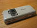 2003 Ford Crown Victoria - Nokia Nseries cell phone with Carl Zeiss camera lens is shown on a wooden table.