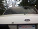 2000 Ford Crown Victoria - Ford's BS Paint is peeling right in the "flex" zone. The brown stuff you see around the "wound" is clear silicone type…