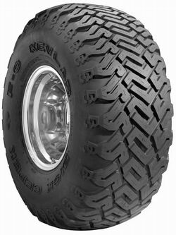 Tire with 'KEVLAR' and 'BIGFOOT' text on sidewall, mounted on a chrome rim