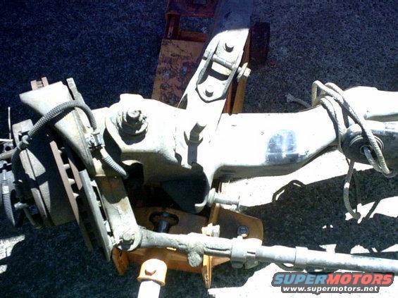 jul01#63.jpg Radius arm ready to come off.
Notice where the bump stop
was hitting