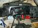 1990 Ford Bronco - Underneath view of a vehicle's frame and suspension system, showing parts and mechanical components.