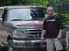 1993 Ford Bronco - Man poses in front of a Ford Bronco, likely from the early 1990s.