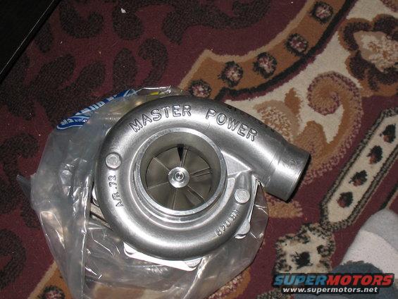 Turbocharger with silver housing and scroll-shaped intake