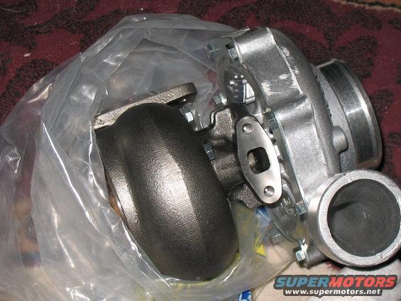 Turbocharger part, possibly for a vehicle, in plastic wrapping
