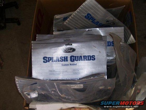 Box of Ford splash guards, some still in packaging