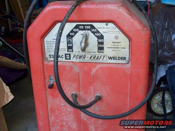 Red Powr-Kraft welder with amperage dial and Montgomery Ward label