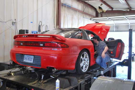 Red 1991 Mitsubishi 3000GT VR-4 rear view on dynamometer