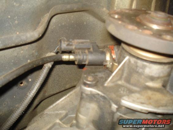 close-up of vehicle transmission sensor and wiring
