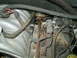 1996 Ford Bronco - Close-up view of engine components, including fuel lines and electrical connectors.