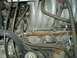1996 Ford Bronco - Close-up view of an engine bay, focusing on the distributor cap and associated wiring.