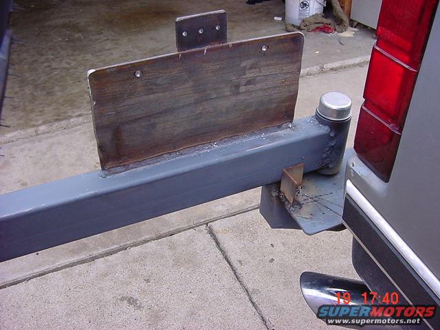 license plate mount w/light mount, opend to the stopper 