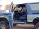 1986 Ford Bronco - Drivers side, flashlight mounted