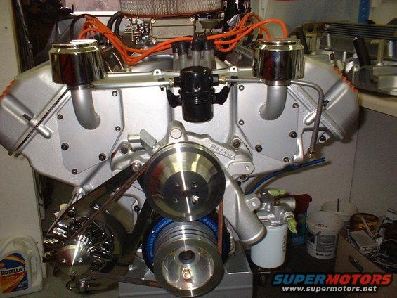 Engine with chrome air cleaner and orange spark plug wires