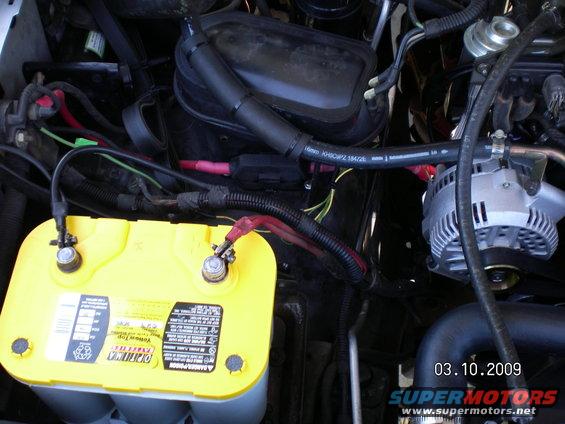 160-amp-3g-alt-001.jpg This is a picture of the 160 3G amp I got from RJM industries a vendor on FSB. You can tell it's not stock because stock ones have 4 holes above the pulley and the higher ones have 2 holes vertically above the pulley instead.