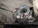 1991 Ford Bronco - Underside view of a vehicle's transfer case with a visible fluid leak.