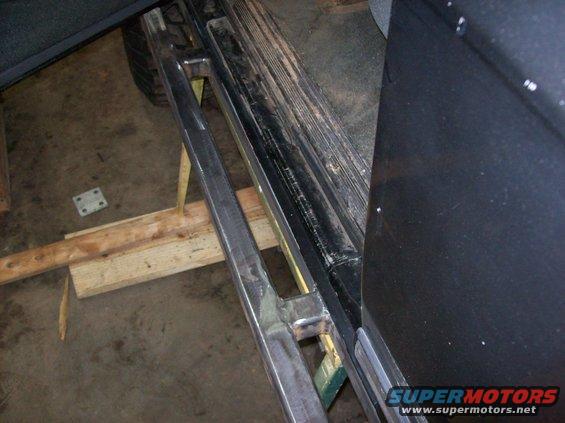 Custom metal sliders installed on a vehicle's side