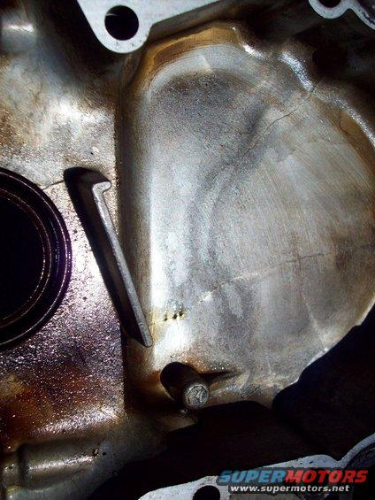 100_0111.jpg timing cover interior crack