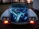 1972 Ford Ranchero - A 1972 Ford Ranchero is shown from the front, with a digital overlay of its engine components.