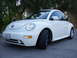 2003 Volkswagen Beetle - White 2003 Volkswagen Beetle with California plate 5BPV410.