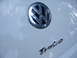 2003 Volkswagen Beetle - The Volkswagen emblem and 'Turbo' script are visible on the car's exterior.