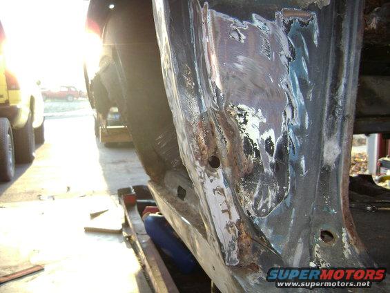 the right door jam has been shot looks like a 45 hole 
it passed threw the inner wheelwell probably got the tire        Humpf interesting ..If cars could talk...