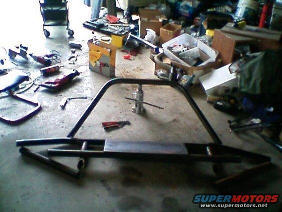 0322091116.jpg second rendition mocked up. you can see the steel plate laid out for the winch. needs the mounting brackets to be fitted to the truck and welded up. the side braces still haven't been made yet. nor has the diamond plate on the sides.