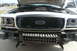 REMOVED THE BUMPER COVER TO REMOVE THE POLICE BRUSH GUARD BRACKETS AND VIC HEADER PANEL