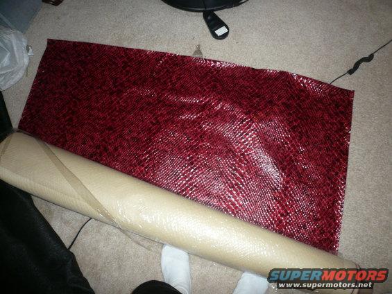 IM AN ANIMAL HUH...THATS BOACONSTRICTOR SNAKE SKIN. IT KANDY RED SO IT WILL MATCH MY PAINT AND THE KNADY RED SNAKE ON THE OUTSIDE.