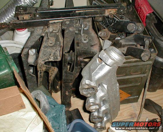 seatsmanifold.jpg '78-89 seat bases.  '88 5.0L R exhaust manifold (car, note HEGO port) - sandblasted & painted inside & out in ultra hi-temp aluminum.