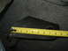 1978 Ford Bronco - A close-up view of a metal component being measured with a yellow tape measure.