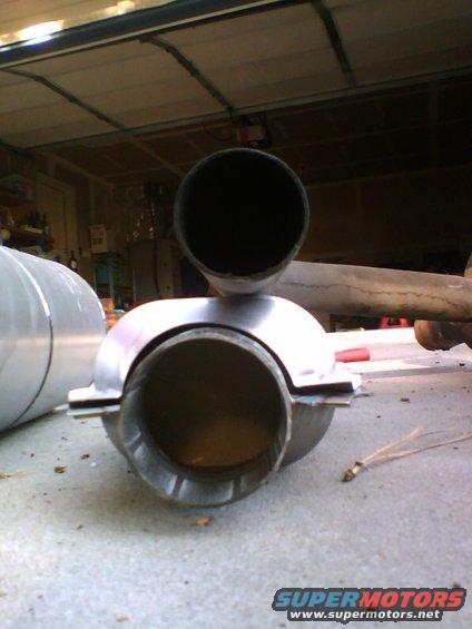 A size comparison between the old and the new exhaust.  

Old   = 1 7/8"     (2.76 square inches)
New = 2 1/2"     (4.90 square inches)

A 77% increase in exhaust size should really help and get things moving.  (Not to mention an unplugged cat and muffler.)

Besides, how can you go wrong with 4.9 square inches of exhaust on a 4.9 straight six?

