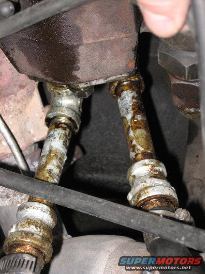 A close up of the coolant heat bolted on.   For anyone doing this swap, be sure to thoroughly clean out the intake where this bolts on or the coolant going through will do it for you, filling your entire cooling system with carbon.

I learned this the hard way and wondered why my coolant was turning brown.  Fortunately, a nice coolant flush with a $5 coolant cleaner bottle from Walmart did the trick.

