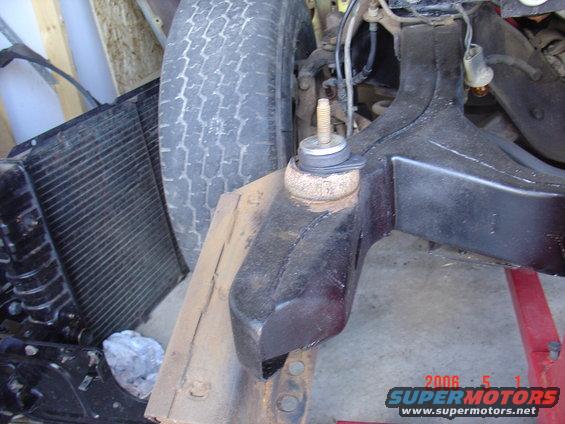 new upper bushing sitting on old lower bushing.