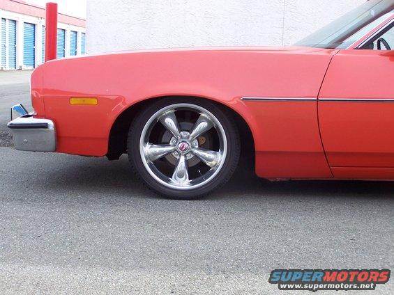 100_2486.jpg I cut 1.5 coils off the front coil springs to get the car down 2" in the front. This was a bit too low, ride suffered and it dragged on everything. Now I've gone back to new small block springs with a 1/2 coil cut off; it sits about an inch higher than this, rides well, and looks right.