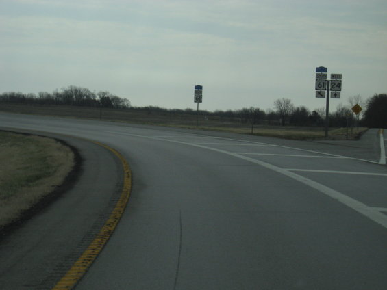 Highway intersection with signs for routes 61 and 24