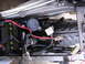 1992 Yamaha FZR600 - Close-up of motorcycle electrical components including the battery and wiring harness.