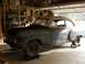 1953 Chevrolet Bel Air - This 1953 Chevrolet Bel Air is in a garage, showing its 3q-front view with blue paint and signs of rust.