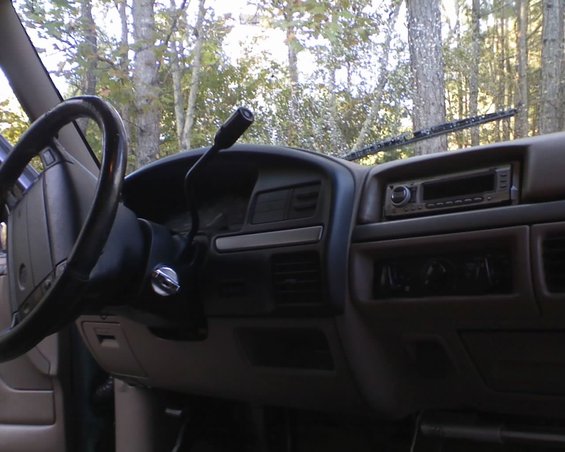 1996 Ford Bronco interior with steering wheel and dashboard