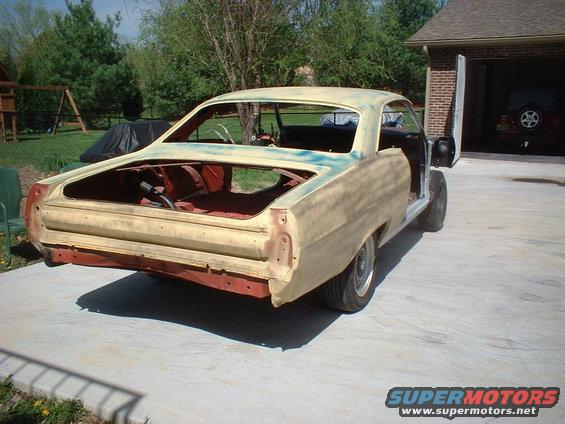 1967 Mercury Cyclone rear quarter panel in primer, doors open