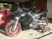 2008 Kawasaki Ninja R - Black 2008 Kawasaki Ninja R motorcycle with flame decals parked outdoors.