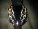 2008 Kawasaki Ninja R - Rear view of a black motorcycle fender adorned with gold flame graphics.
