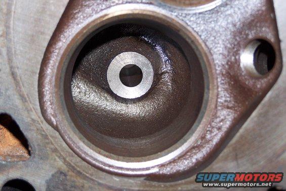 100_0845.jpg I did a little porting in the bowl area under the valves; this is the "before" shot