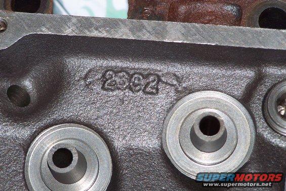 100_0843.jpg the valve srping seats have been machined for heavier valve springs; teflon valve seals and bronze guides will be installed.