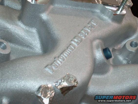 hp-camera-pics-291.jpg I used an Edelbrock Performer 351-2V aluminum dual-plane intake manifold; I ground off the emblems and painted it Ford Corporate Blue, so it looks like the original manifold.